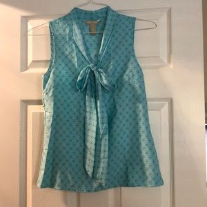 Teal sleeveless bow accent shirt